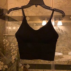 I’m selling 4 seamless rib-knit sports bra